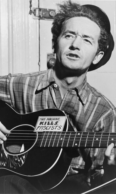 1 Woody Guthrie By New York World Telegram and the Sun staff photographer Al Aumuller Public Domain Wikimedia Commons